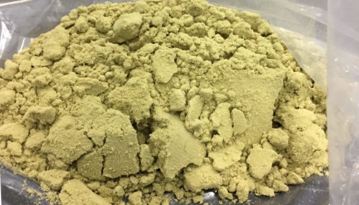 a pile of dry sift concentrate set on a plastic bag