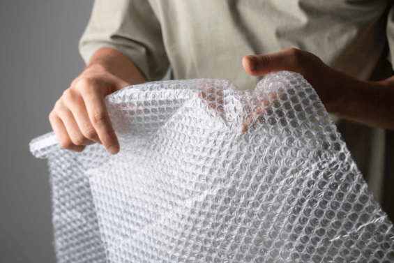 Person holding a bubble wrap